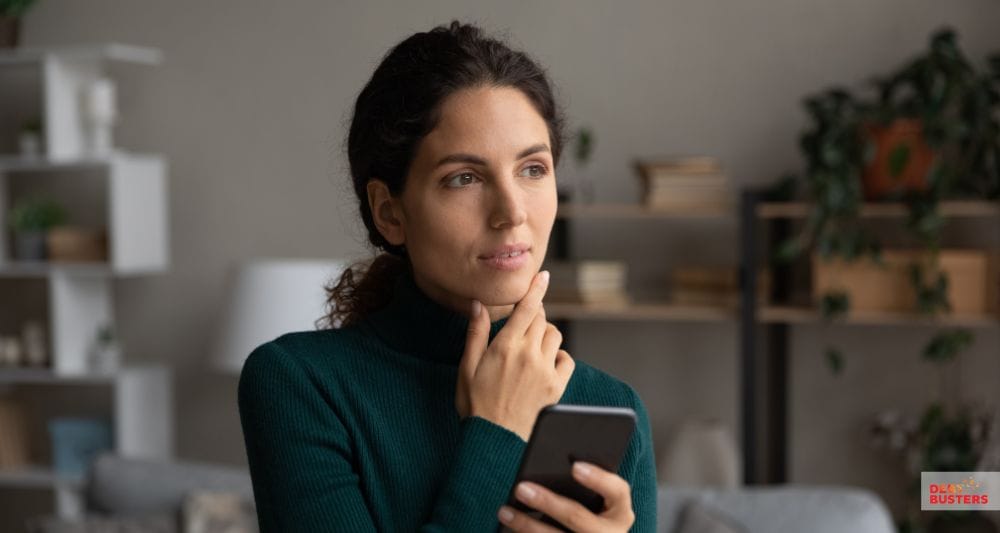 ChatGPT said:
Woman holding phone, thoughtfully considering eligibility for the bankruptcy means test