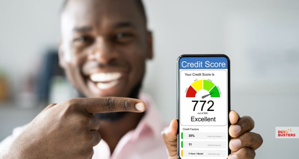 Smiling man shows excellent score while learning what is a good credit score Australia.